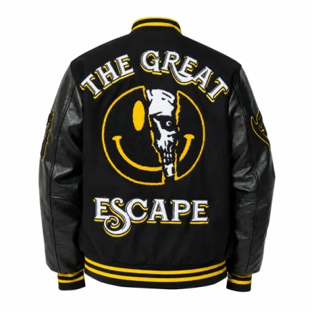 Black varsity jacket with a yellow smiley and white skull graphic beneath The Great Escape lettering.